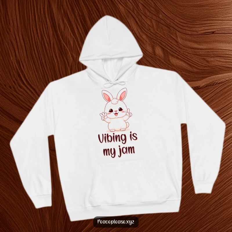 Funny hoodie showcasing a fluffy bunny with a beaming smile, holding a peace sign, perfect for warm and humorous wear.